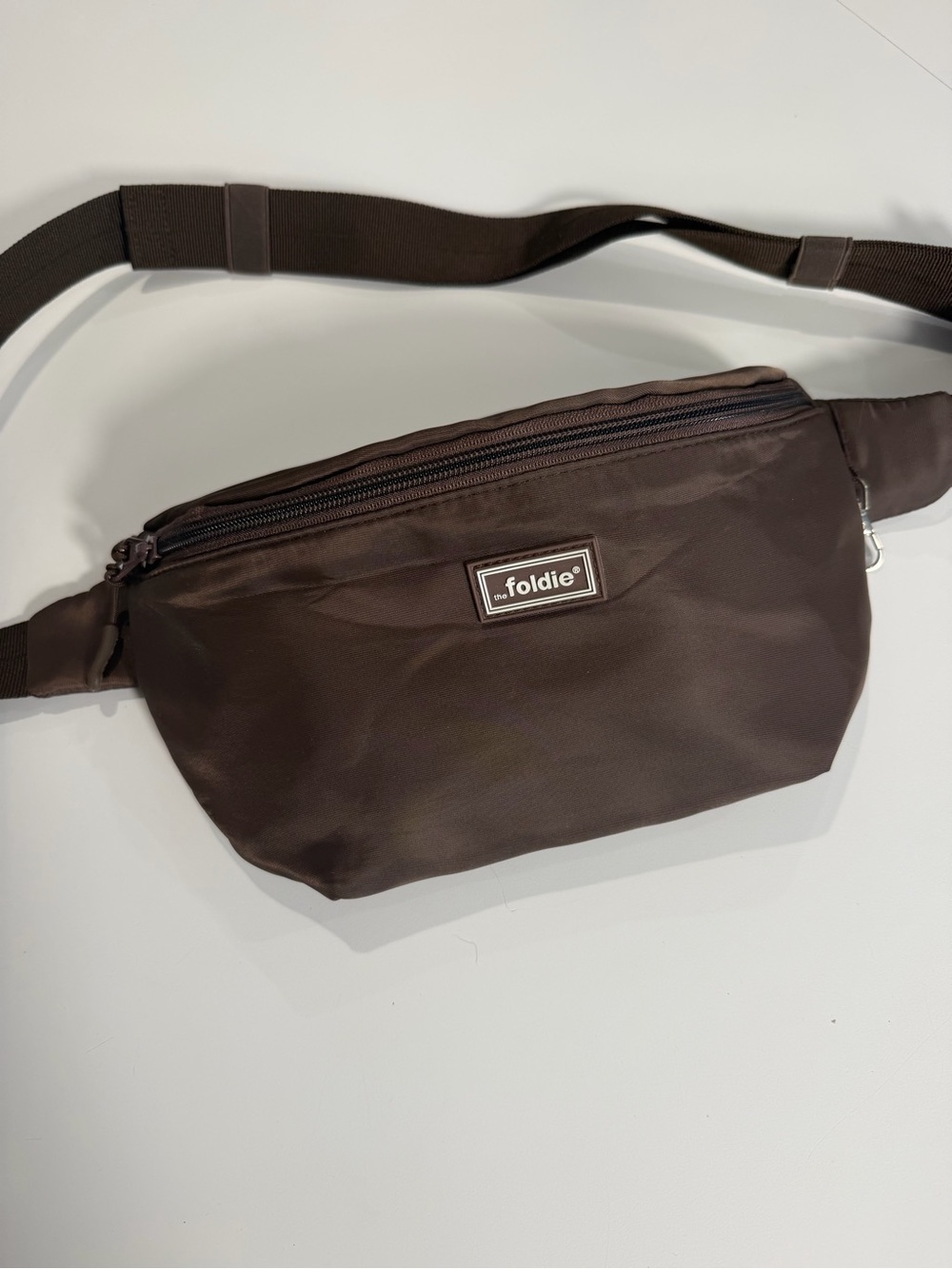 The Foldie Brown belt bag crossbody fanny pack sling travel adjustable strap